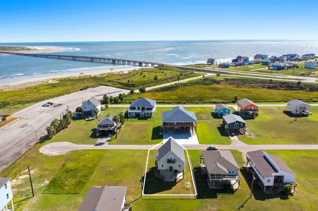 a view of a swimming pool with an ocean view