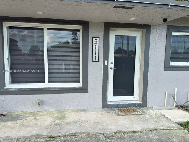 a view of a door front of a house