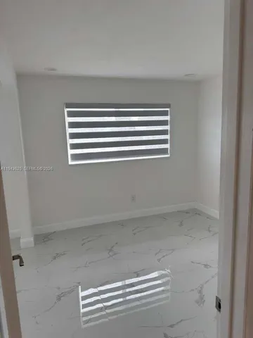 a view of empty room with window