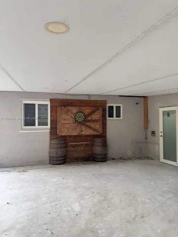 an empty room with furniture