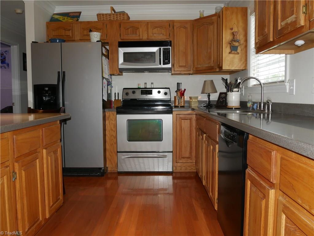 1615 Rosebud Road Walnut Cove, NC 27052 - Photo 4 of 20 Spacious kitchen with Islands, Corian Countertops, Bosch Dishwasher,