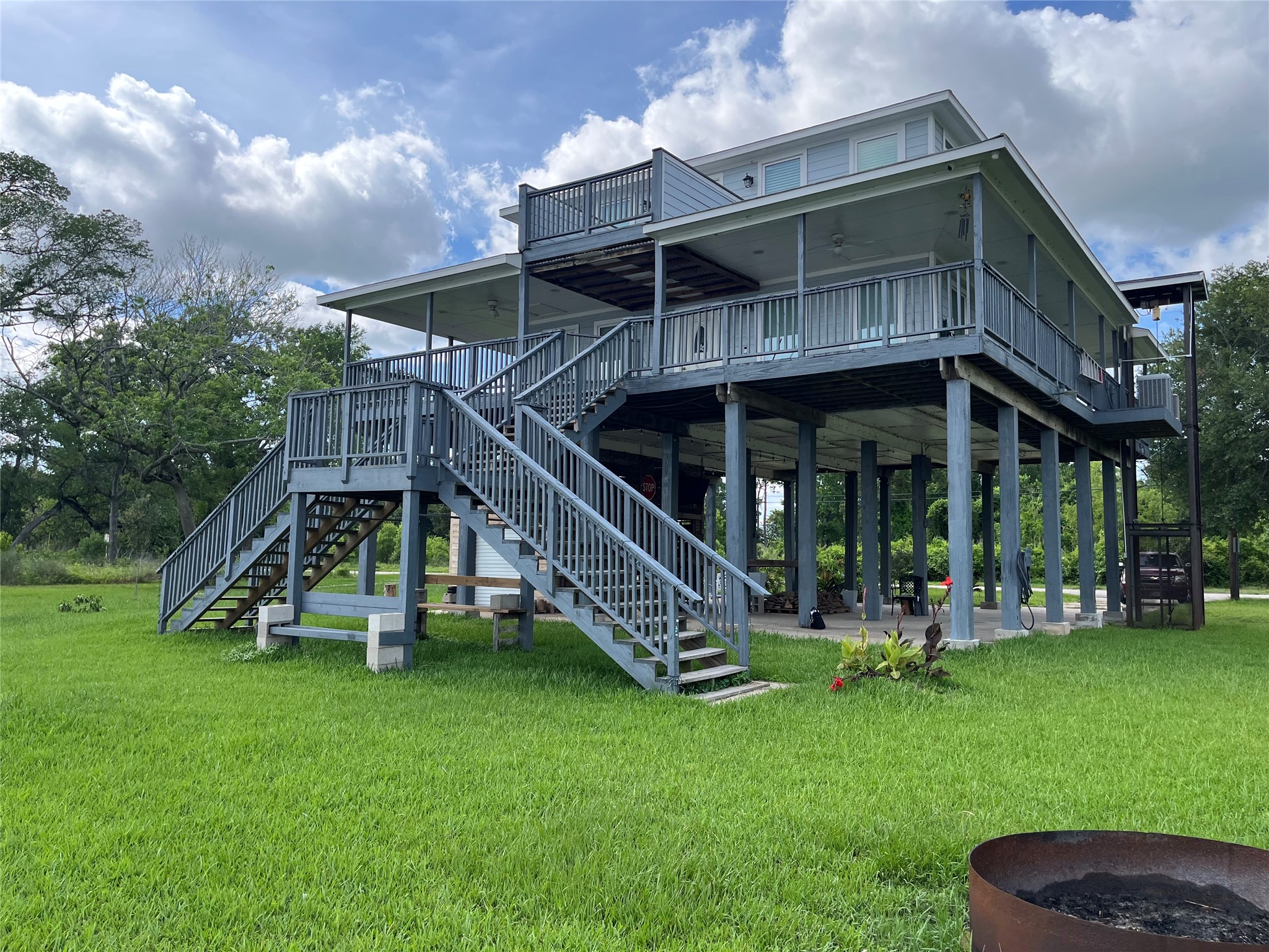 21511 Rio Villa Drive Houston, TX 77049 - Photo 13 of 45 a view of a house with a yard table and chairs