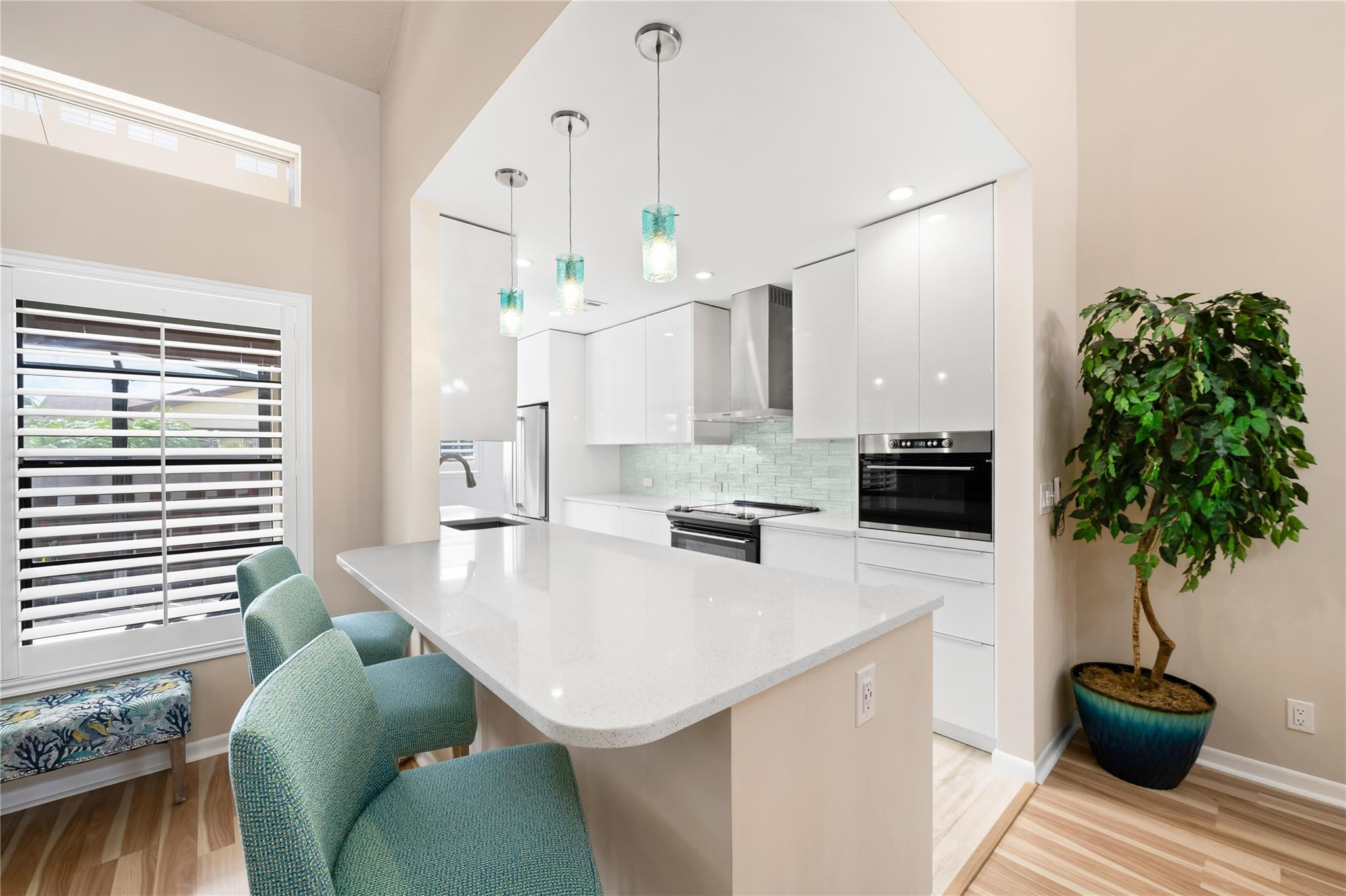14067 Nesting Way, Unit C Delray Beach, FL 33484 - Photo 2 of 32 a living room with furniture and a chandelier