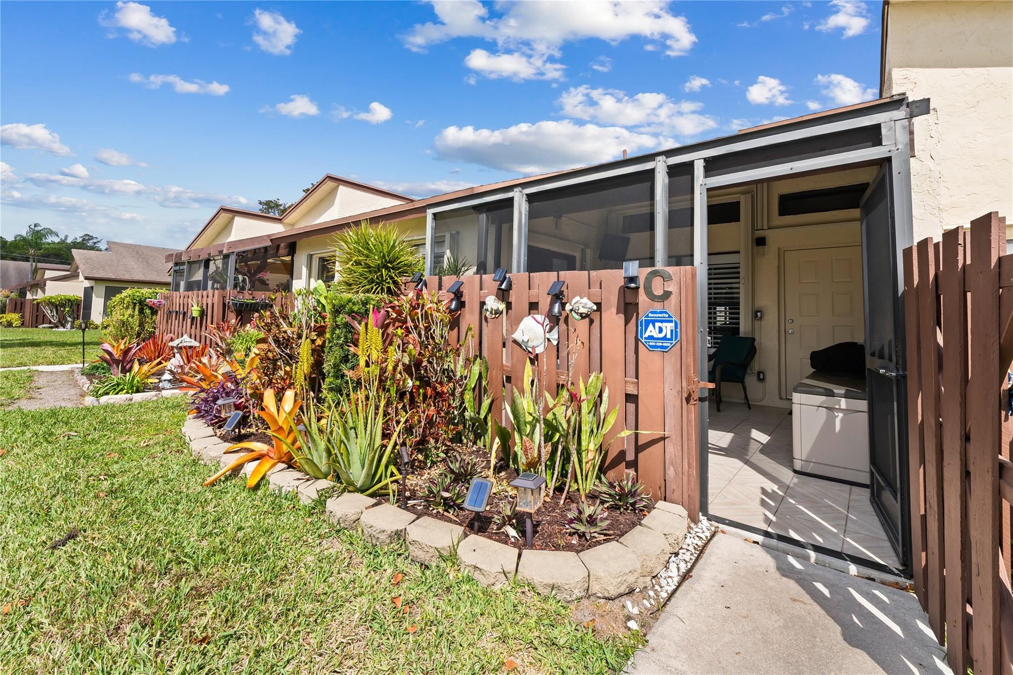 14067 Nesting Way, Unit C Delray Beach, FL 33484 - Photo 30 of 32 a view of entryway front of house
