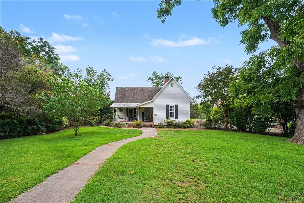 355 Inman Road Hampton, GA 30228 - Photo 45 of 47 a front view of a house with a yard