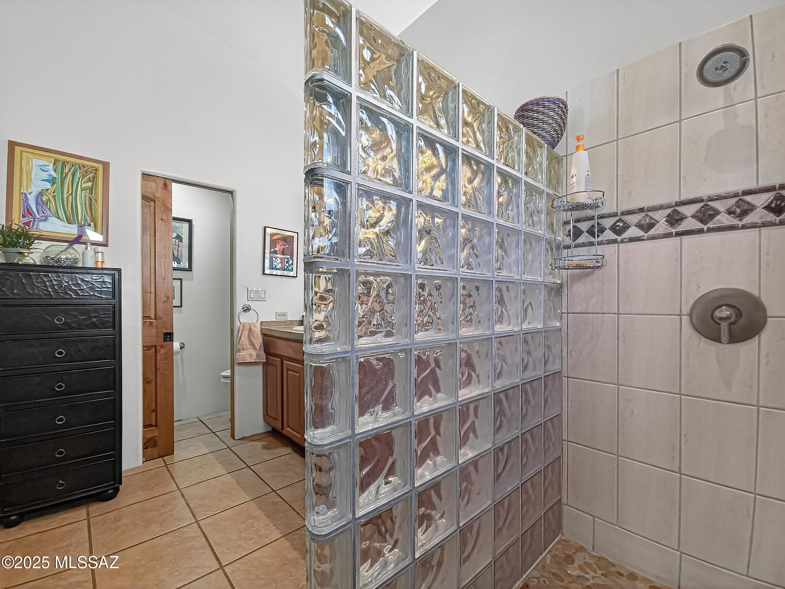 448 Dale Road Pearce, AZ 85625 - Photo 24 of 47 custom tile throughout. river rock shower floor