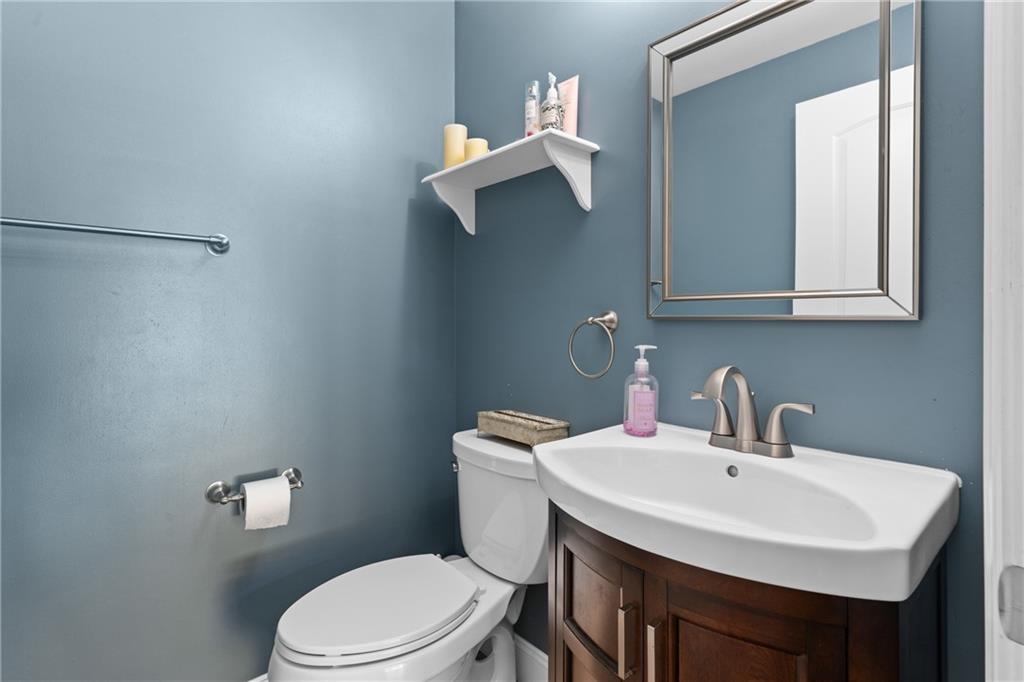 304 West Starz Road Cheswick, PA 15024 - Photo 17 of 48 a bathroom with a sink a toilet and mirror