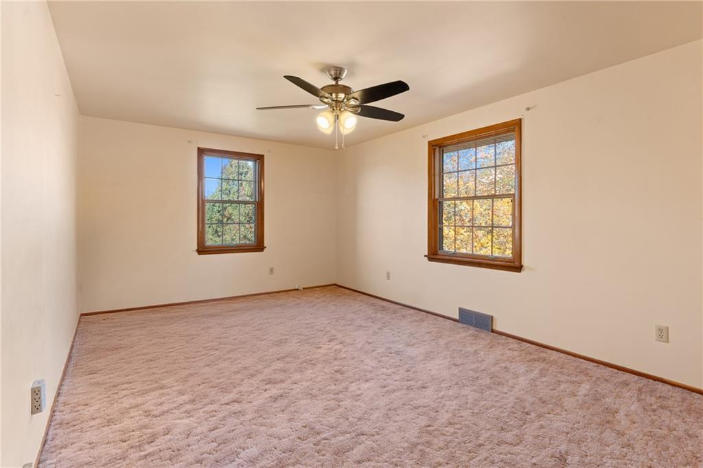 304 West Starz Road Cheswick, PA 15024 - Photo 20 of 48 an empty room with windows and fan