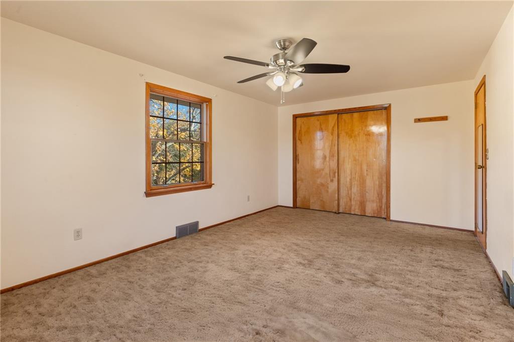 304 West Starz Road Cheswick, PA 15024 - Photo 21 of 48 an empty room with windows and fan