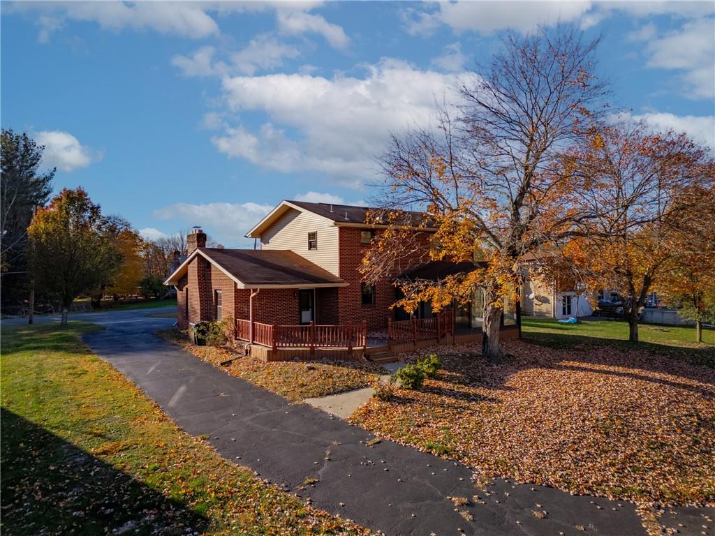 304 West Starz Road Cheswick, PA 15024 - Photo 28 of 48 a front view of a house with garden