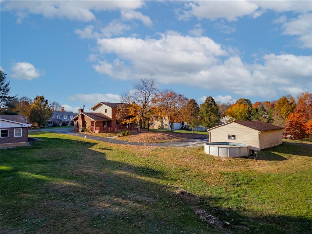 304 West Starz Road Cheswick, PA 15024 - Photo 29 of 48 an aerial view of a house with swimming pool garden and lake view