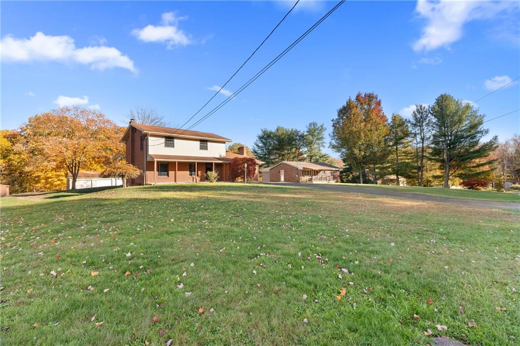 304 West Starz Road Cheswick, PA 15024 - Photo 3 of 48 a house view with garden space