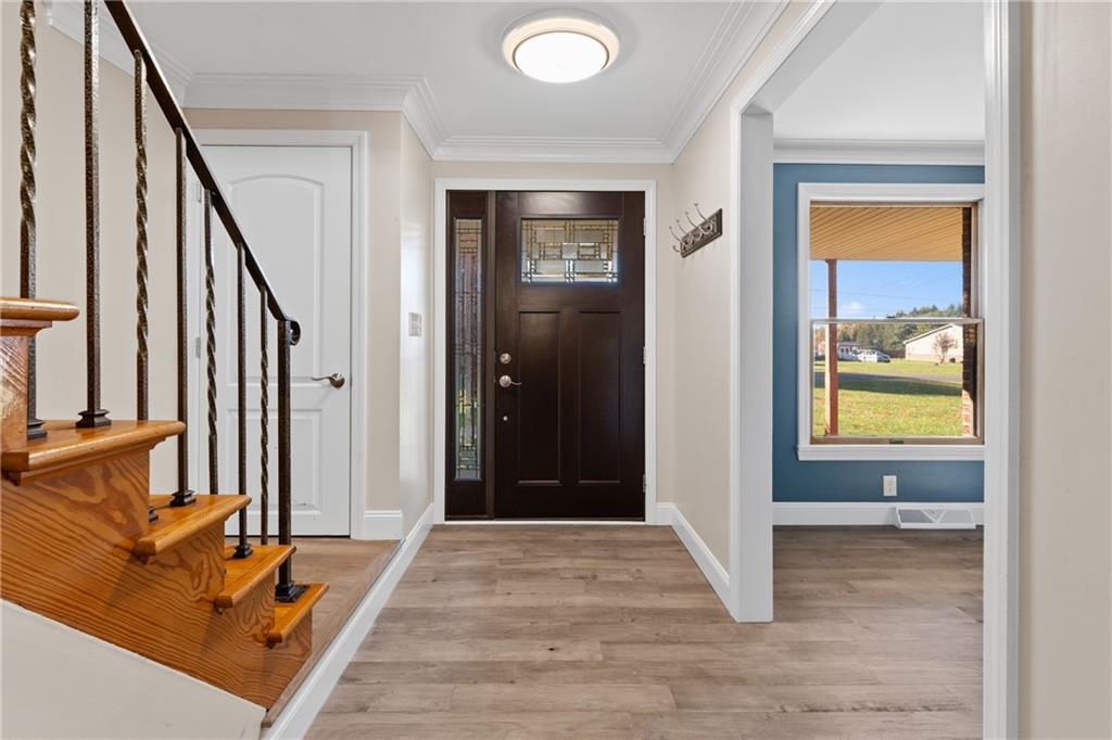 304 West Starz Road Cheswick, PA 15024 - Photo 4 of 48 a view of a livingroom with furniture and staircase