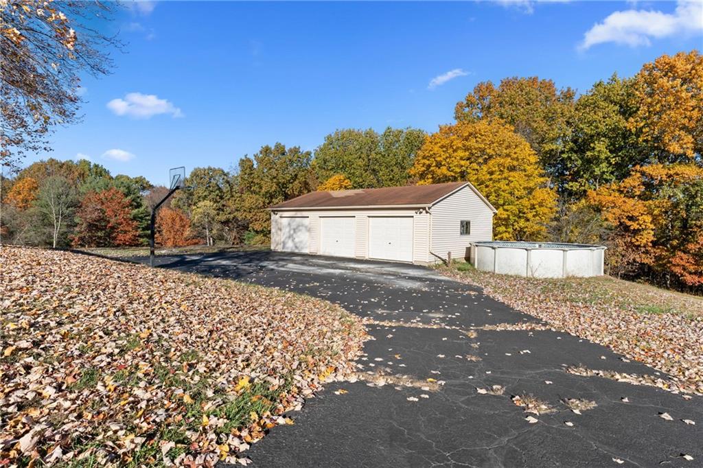 304 West Starz Road Cheswick, PA 15024 - Photo 41 of 48 a view of backyard of house with trees