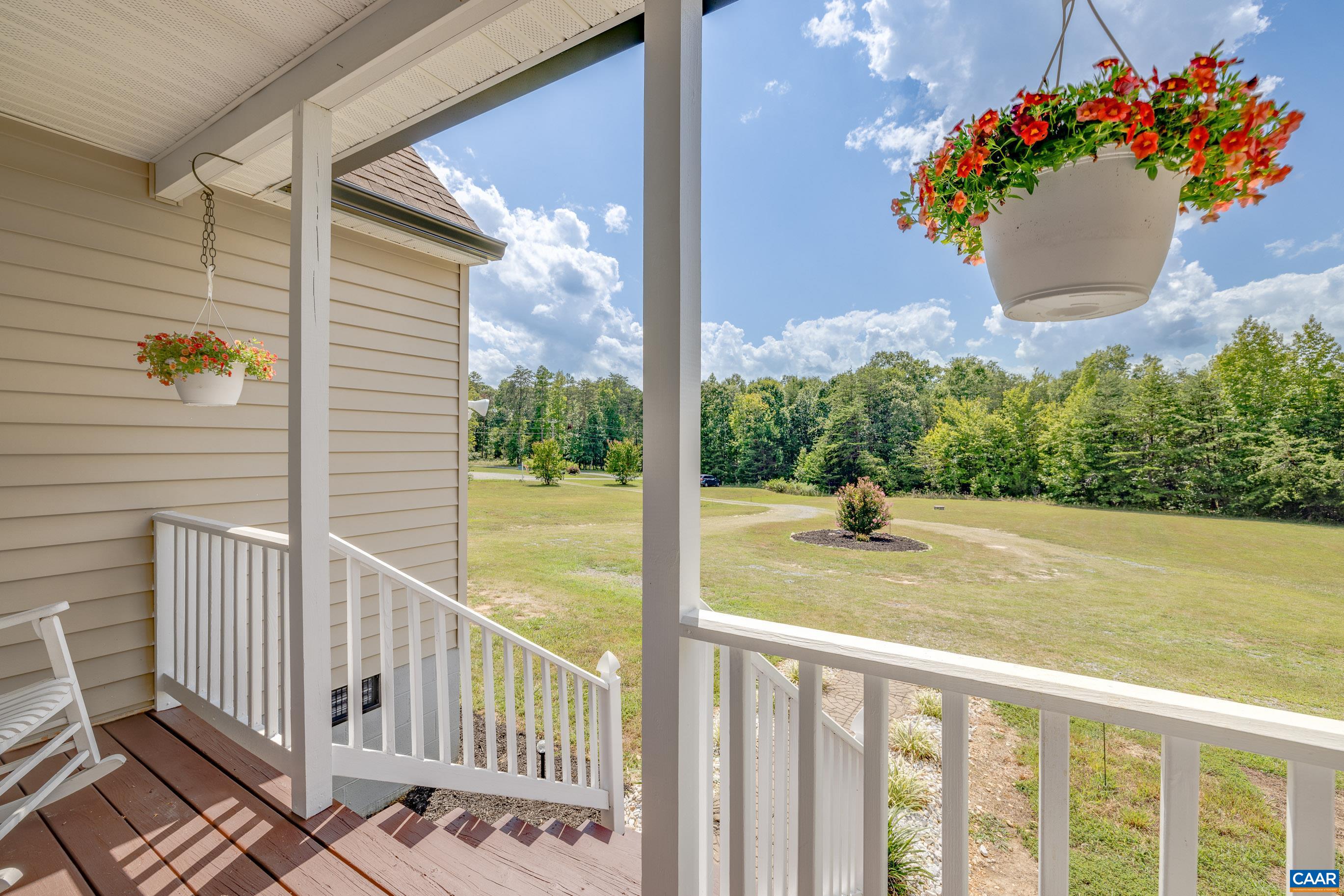7839 Venable Road Kents Store, VA 23084 - Photo 13 of 51 a view of a balcony and floor to ceiling windows