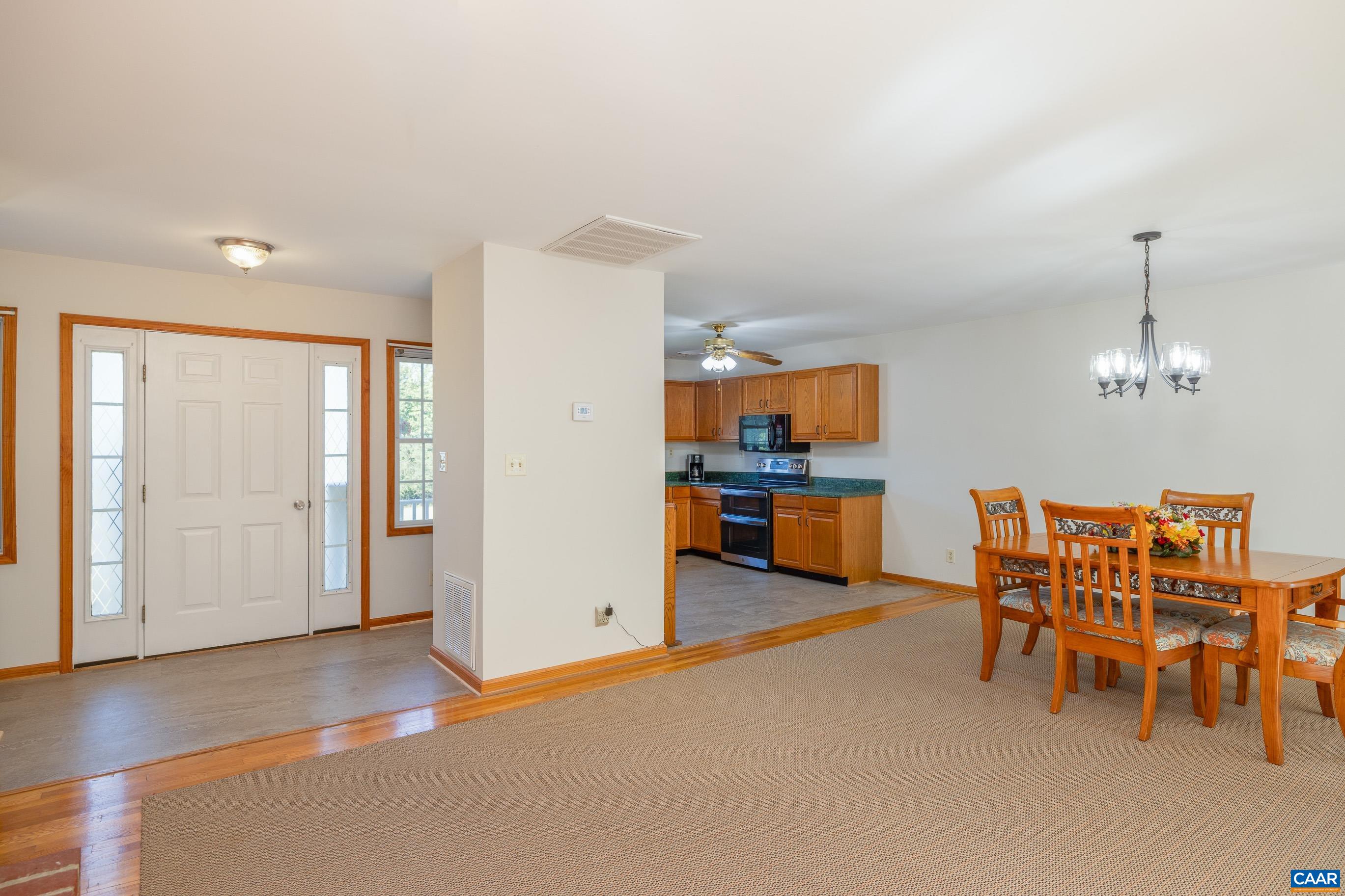7839 Venable Road Kents Store, VA 23084 - Photo 15 of 51 a view of a kitchen and dining room
