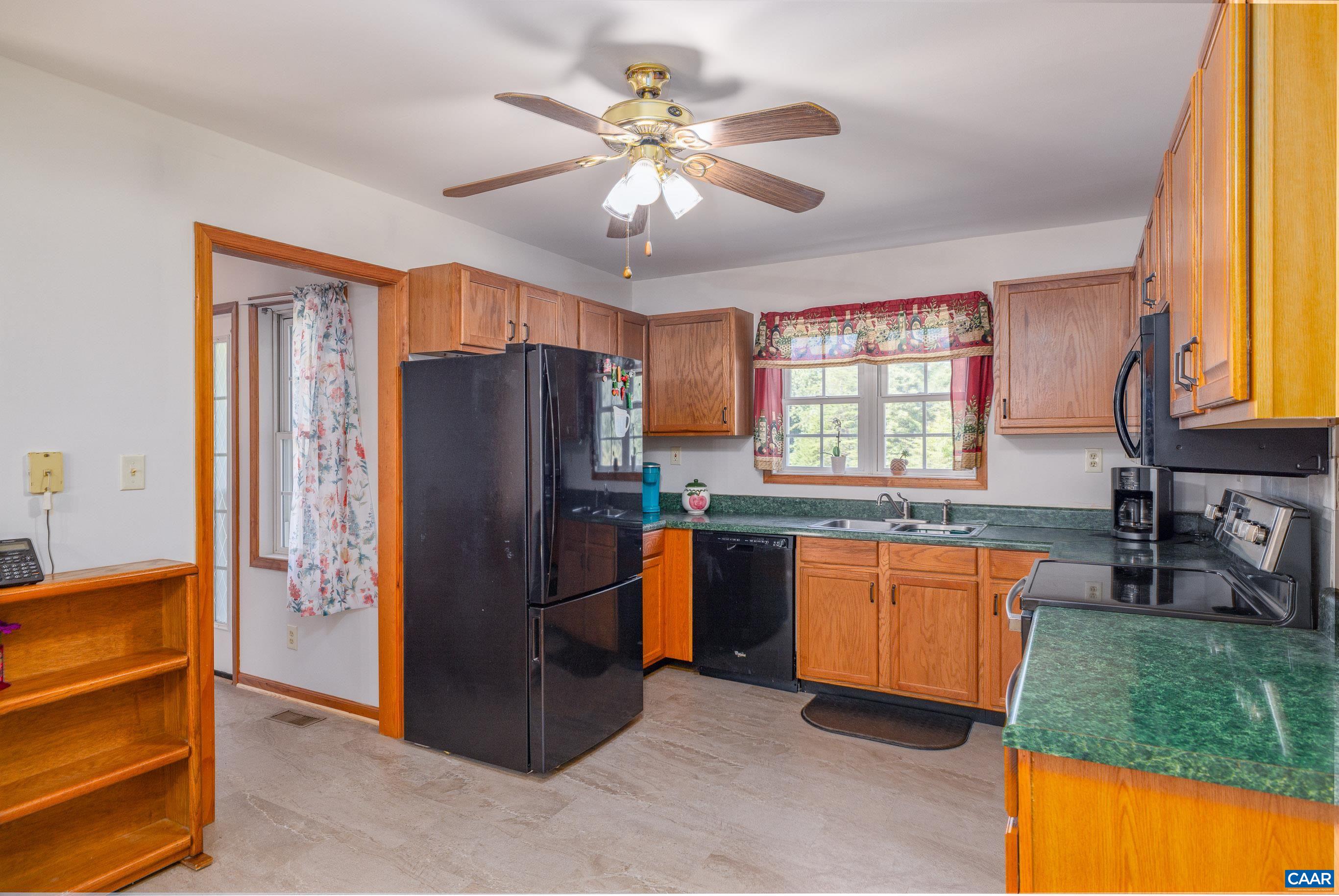 7839 Venable Road Kents Store, VA 23084 - Photo 20 of 51 a kitchen with stainless steel appliances granite countertop a refrigerator a sink dishwasher a stove and a refrigerator