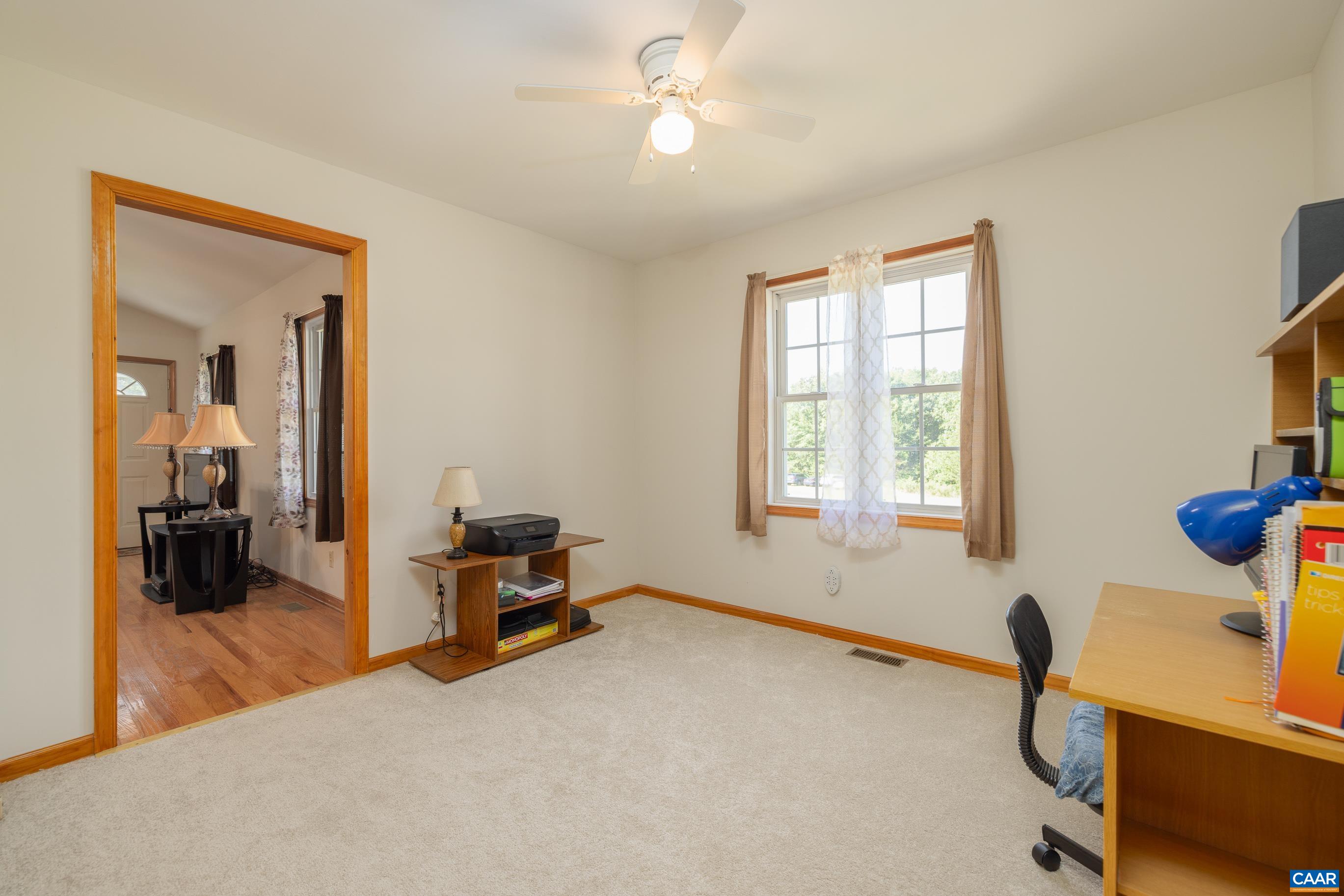 7839 Venable Road Kents Store, VA 23084 - Photo 30 of 51 a bedroom with furniture and a window