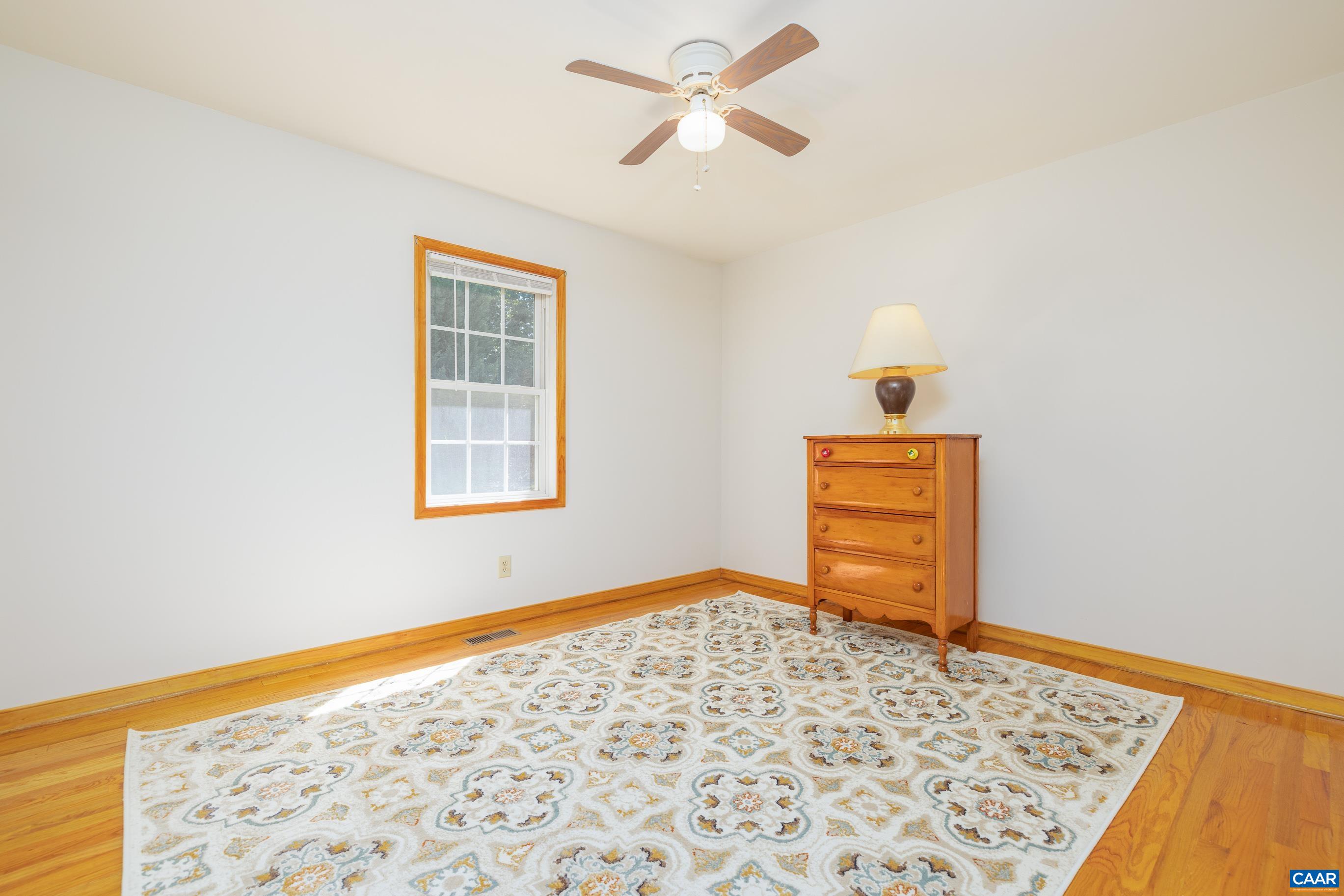 7839 Venable Road Kents Store, VA 23084 - Photo 34 of 51 a bedroom with a bed and a window