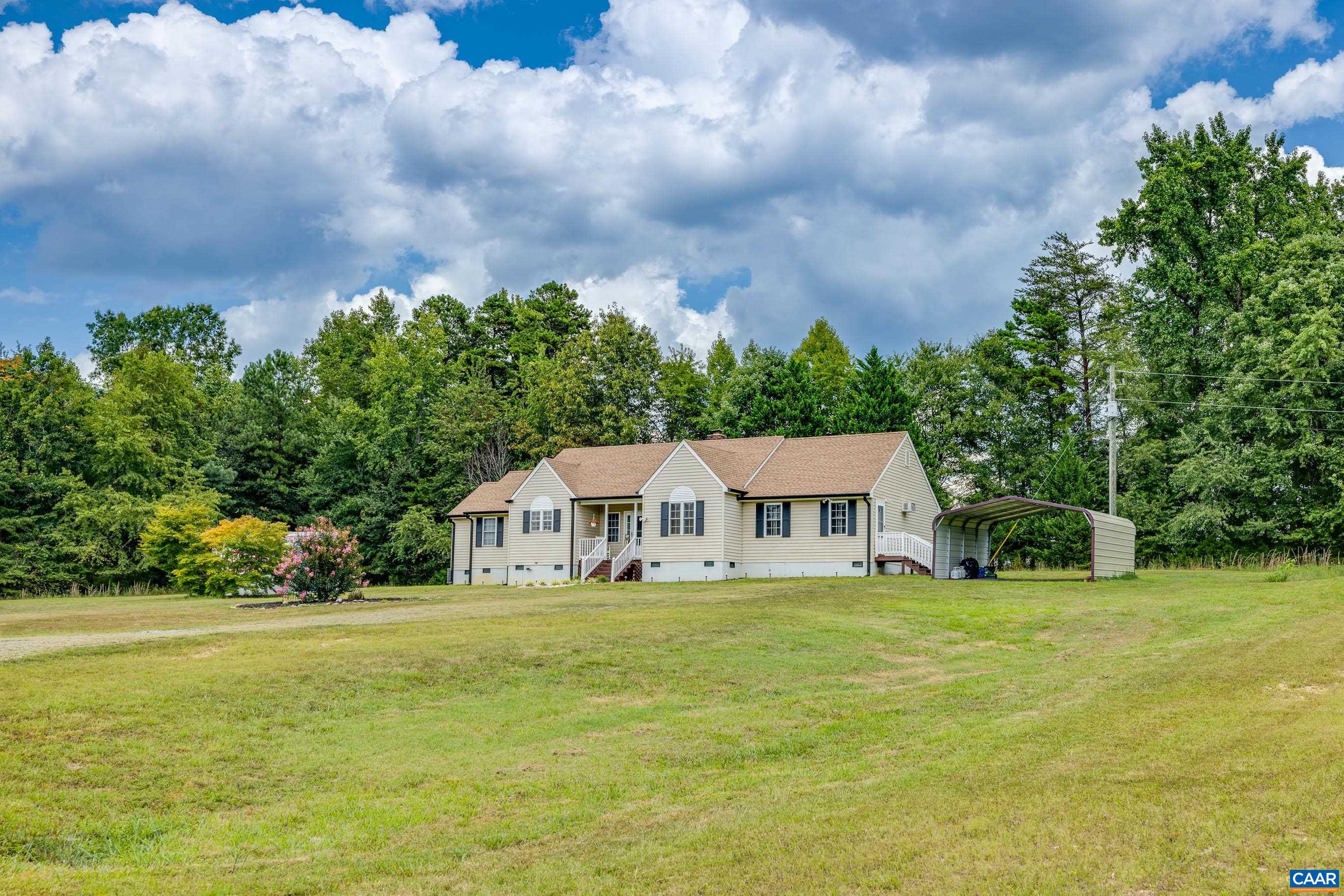 7839 Venable Road Kents Store, VA 23084 - Photo 4 of 51 a house with swimming pool in front of it