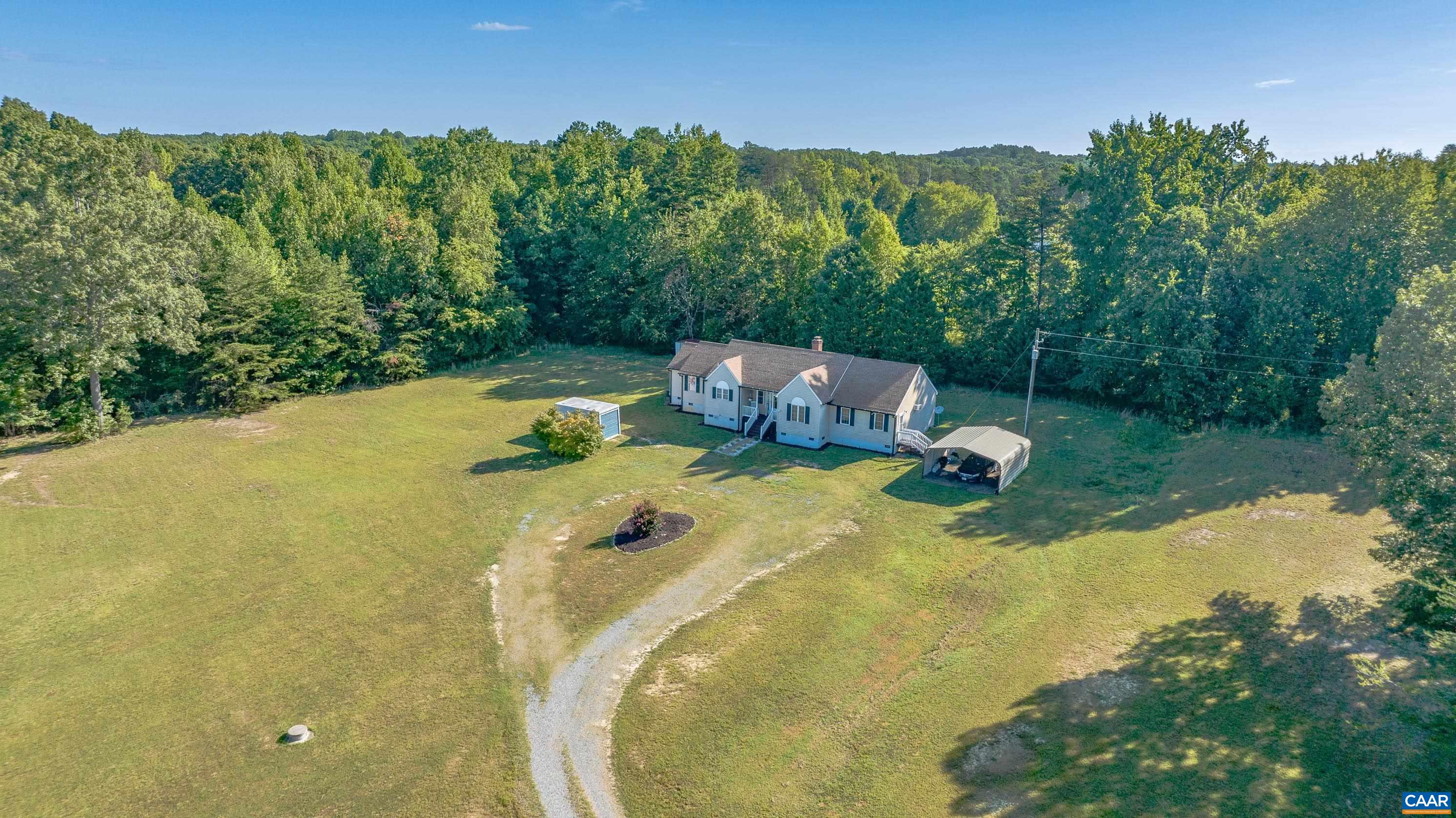 7839 Venable Road Kents Store, VA 23084 - Photo 43 of 51 a view of a swimming pool with a yard