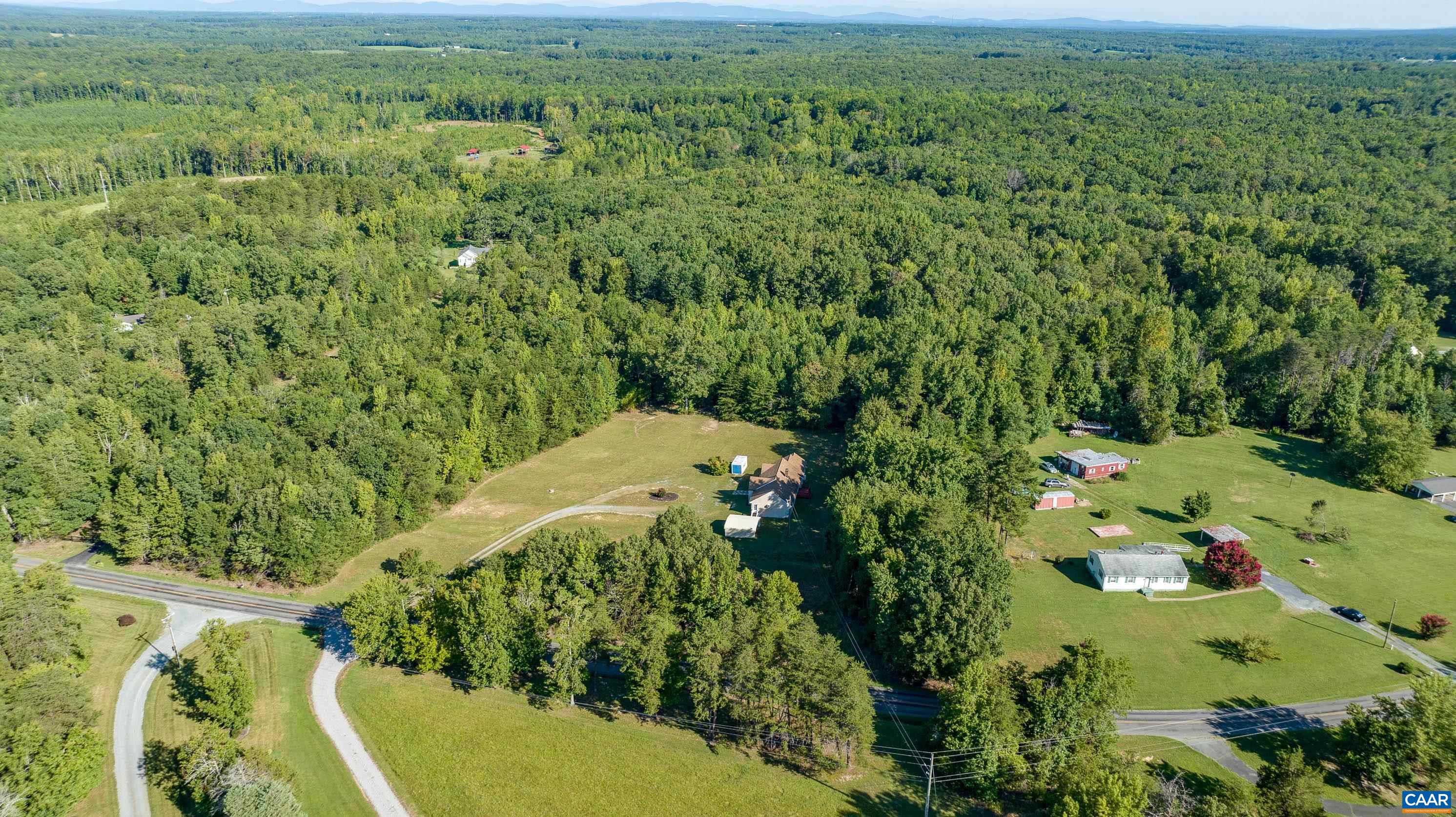 7839 Venable Road Kents Store, VA 23084 - Photo 45 of 51 a view of a forest with a houses
