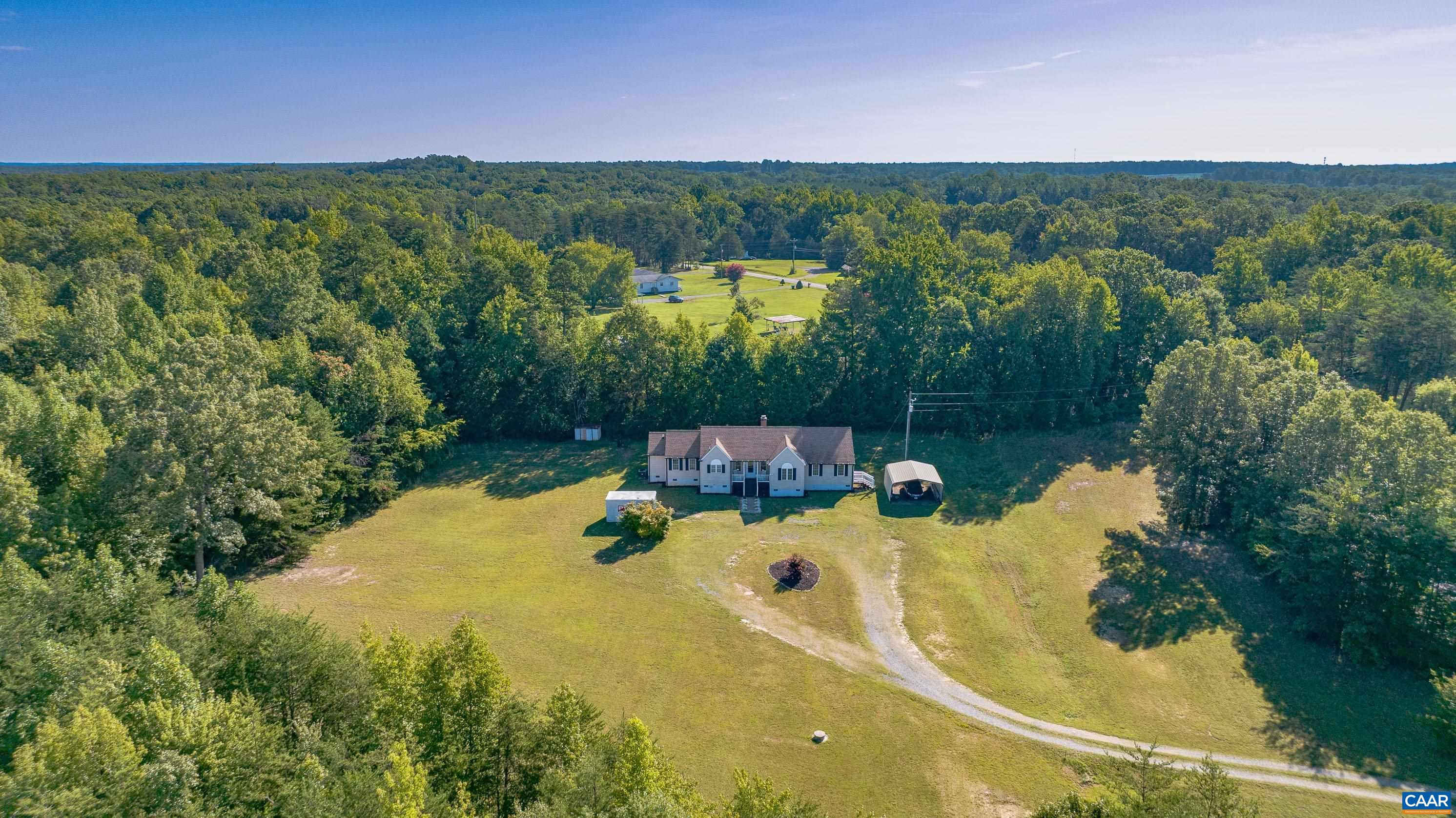7839 Venable Road Kents Store, VA 23084 - Photo 8 of 51 a view of a swimming pool with a yard