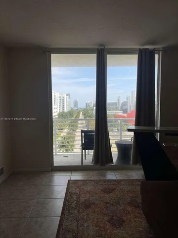 a living room with a large window