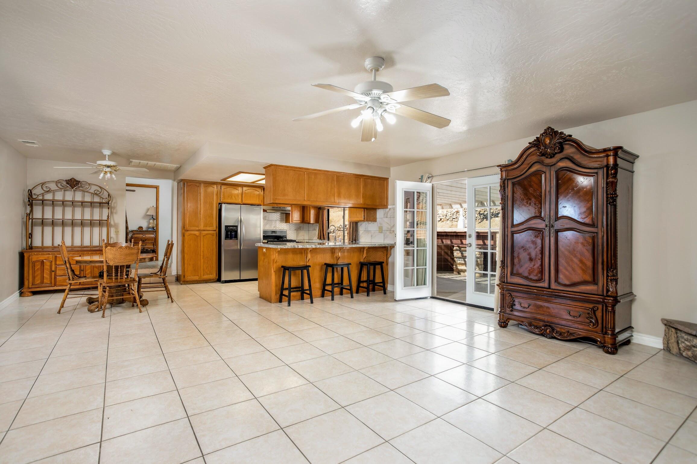 16276 Rancherias Road Apple Valley, CA 92307 - Photo 15 of 27 a view of a livingroom with furniture and a couch
