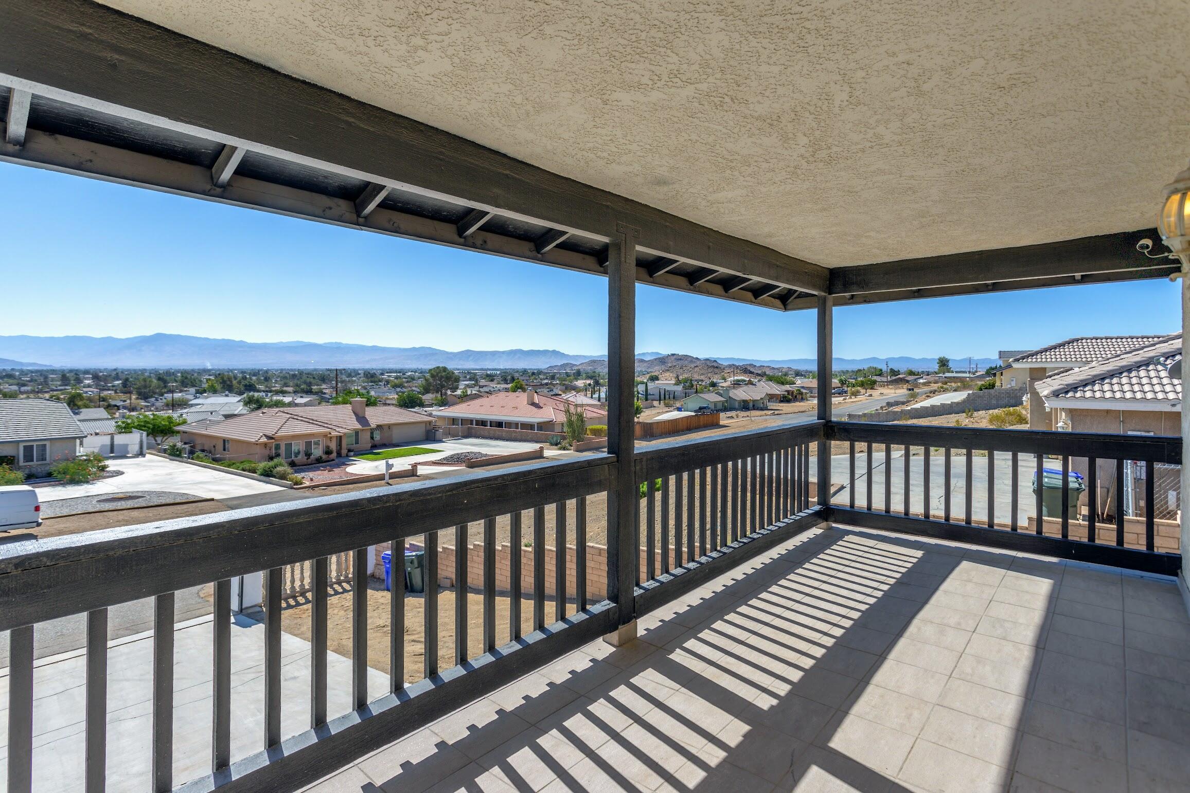 16276 Rancherias Road Apple Valley, CA 92307 - Photo 17 of 27 a view of city from a balcony