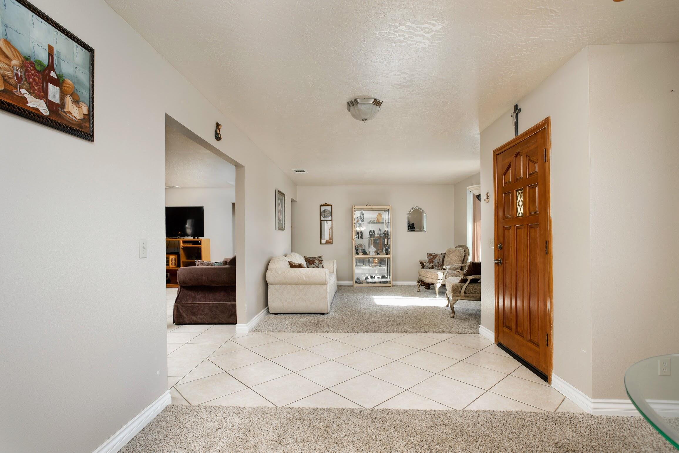 16276 Rancherias Road Apple Valley, CA 92307 - Photo 5 of 27 a living room with furniture