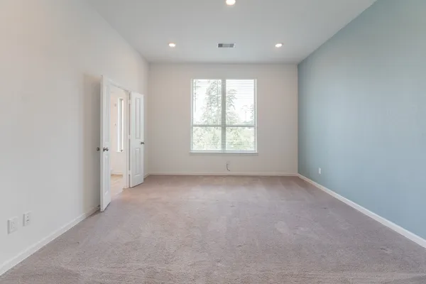 a view of entryway with wooden floor and stairs
