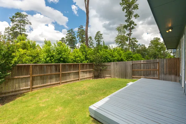 a front view of a house with a swimming pool