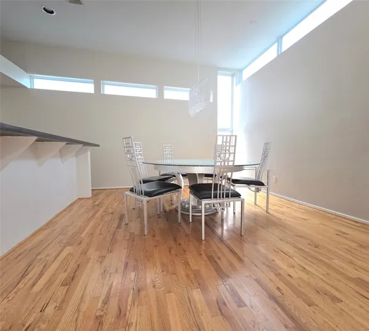 a kitchen with stainless steel appliances a refrigerator and a stove