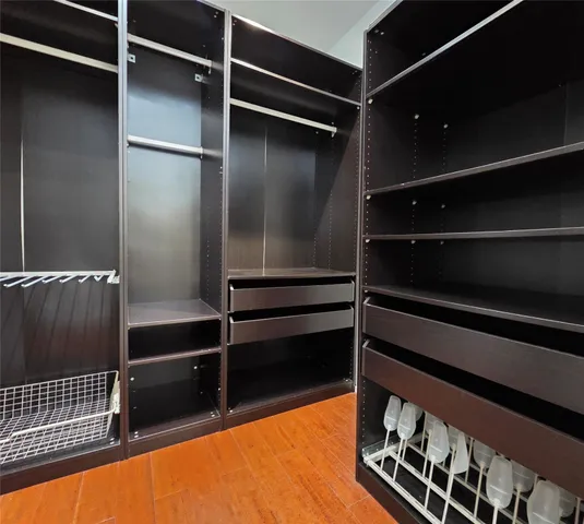 a bathroom with a bathtub and a sink