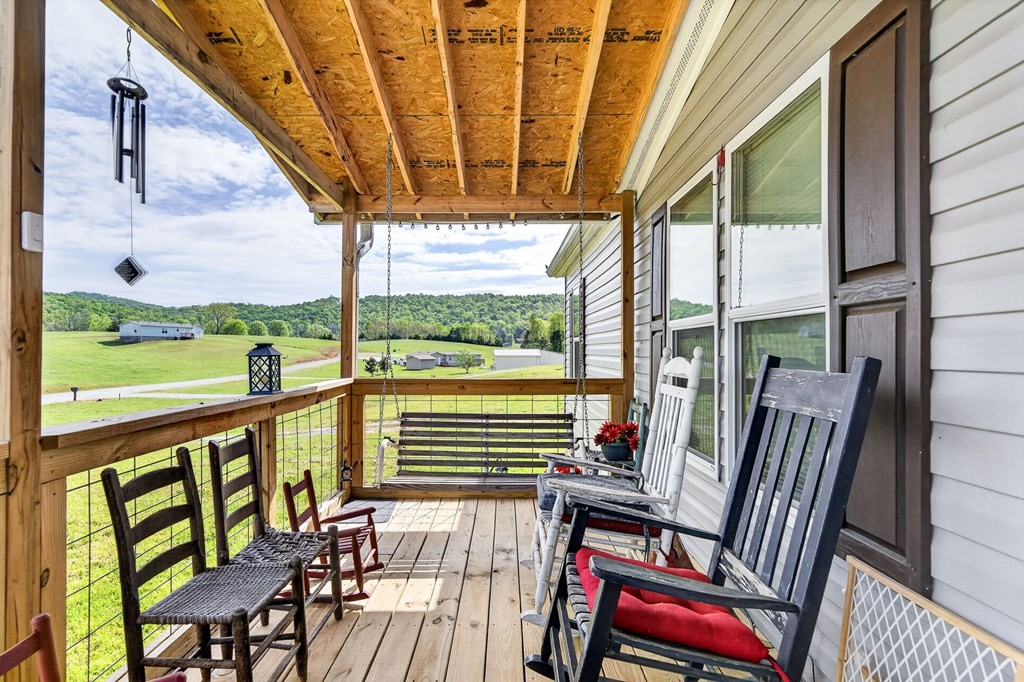 156 Falls View Road Sparta, TN 38583 - Photo 15 of 29 a view of a chair and tables in balcony