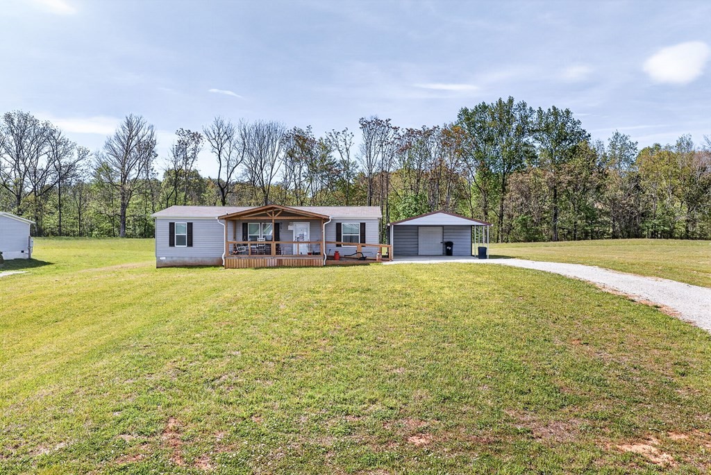 156 Falls View Road Sparta, TN 38583 - Photo 18 of 29 a house view with a swimming pool