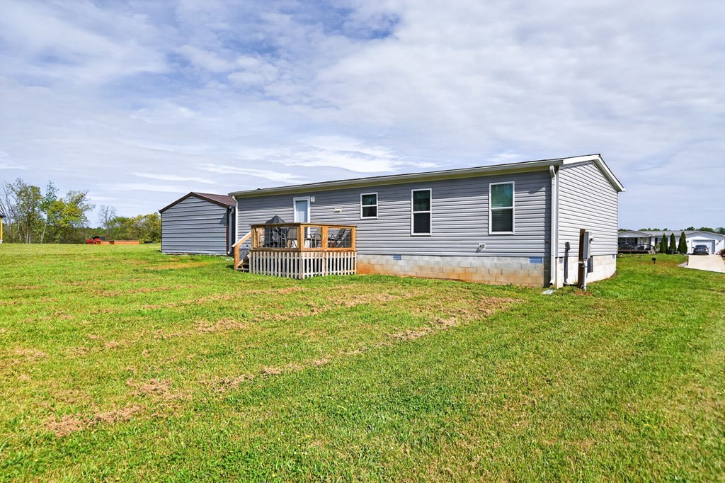156 Falls View Road Sparta, TN 38583 - Photo 21 of 29 a view of a house with a backyard