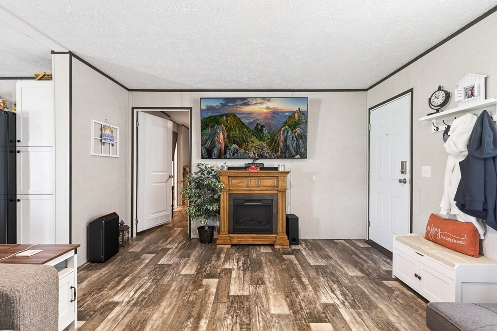 156 Falls View Road Sparta, TN 38583 - Photo 8 of 29 a bedroom with furniture and flat screen tv