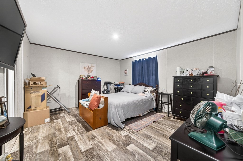 156 Falls View Road Sparta, TN 38583 - Photo 10 of 29 a bedroom with a bed and a dresser