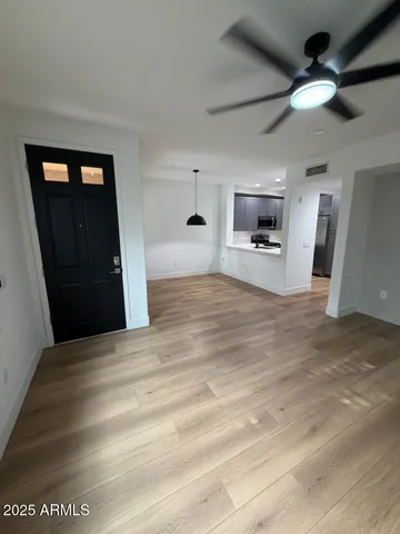 a view of a livingroom with a flat screen tv