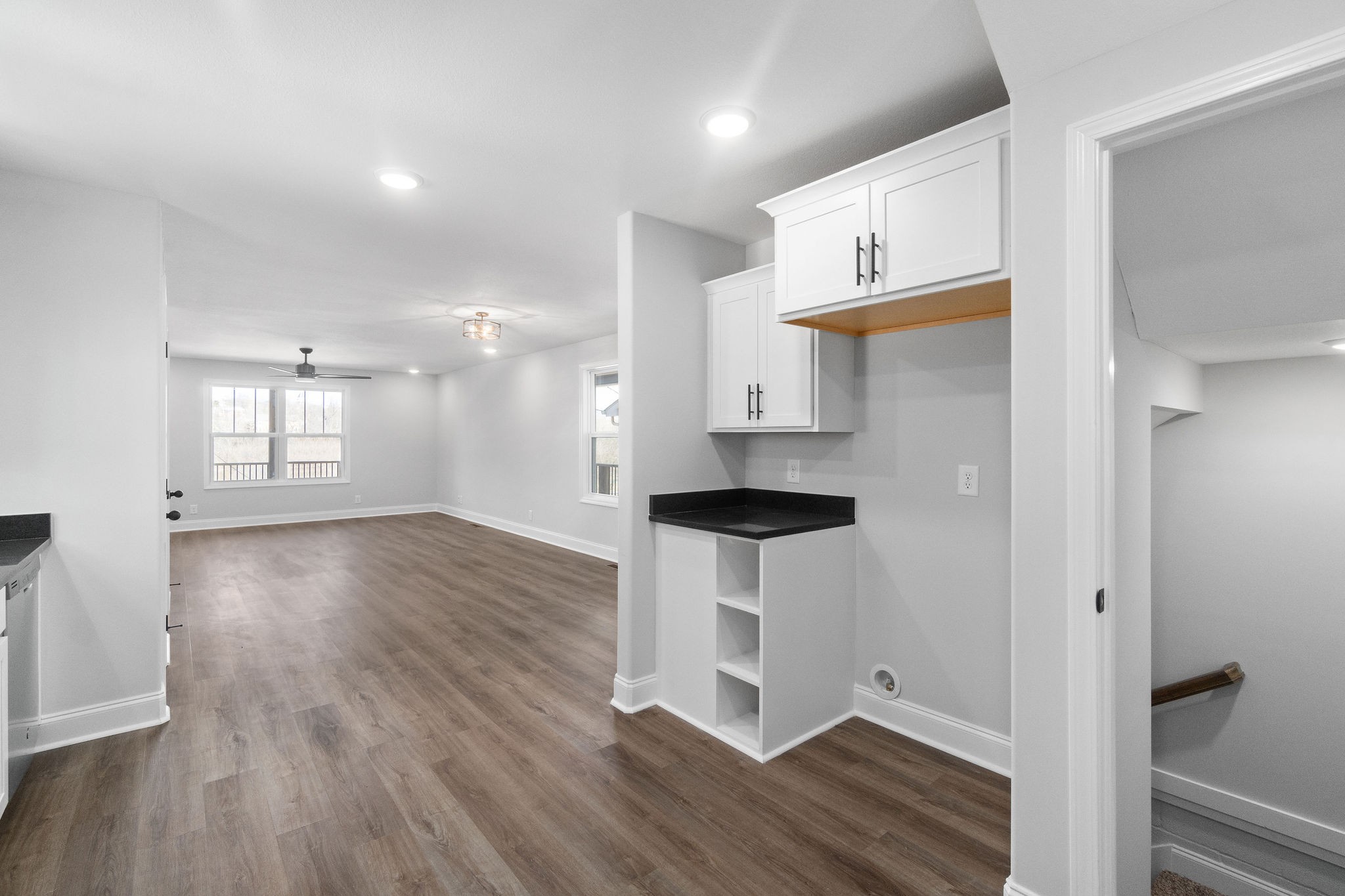 64 West High Street Clarksville, TN 37040 - Photo 11 of 22 a view of wooden floor and windows in a room