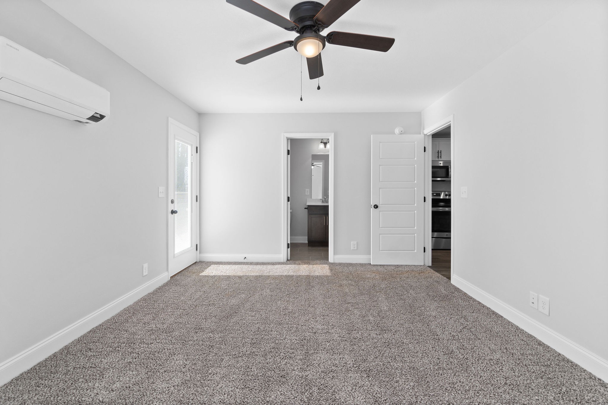 64 West High Street Clarksville, TN 37040 - Photo 13 of 22 a view of an empty room with a ceiling fan