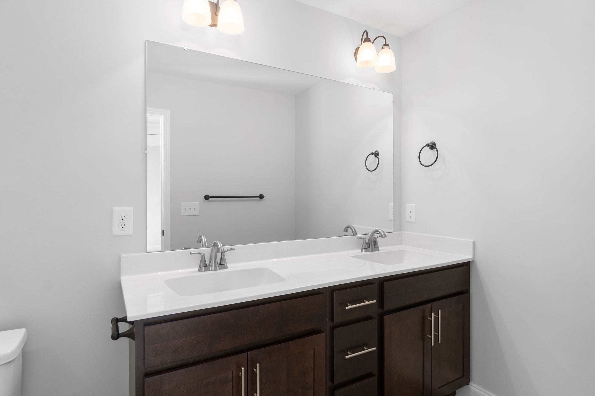64 West High Street Clarksville, TN 37040 - Photo 14 of 22 a sink with a mirror