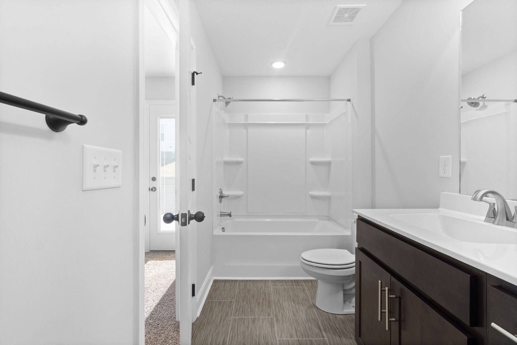 64 West High Street Clarksville, TN 37040 - Photo 15 of 22 a bathroom with a sink a toilet and shower