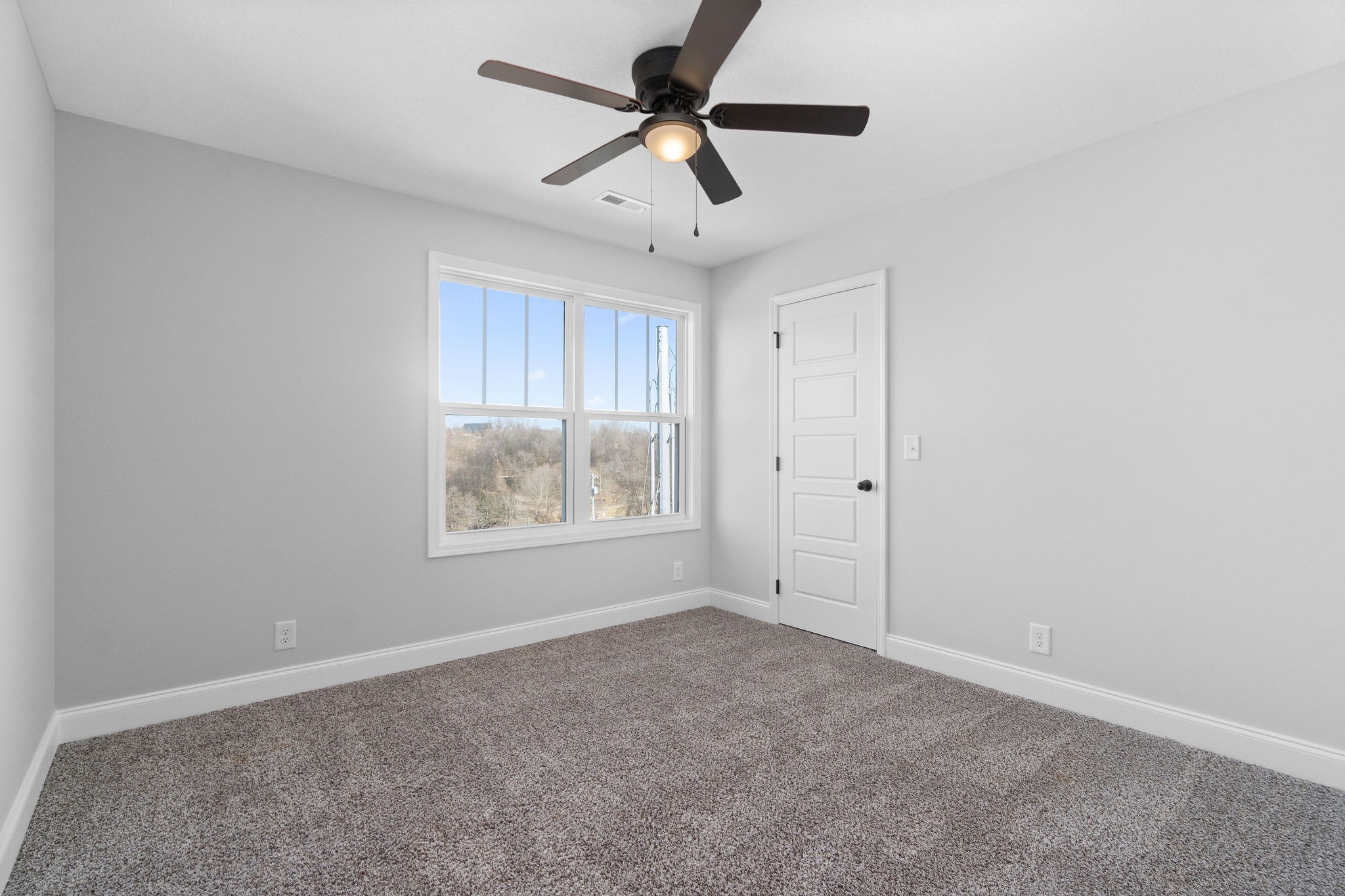 64 West High Street Clarksville, TN 37040 - Photo 19 of 22 a view of an empty room with a window