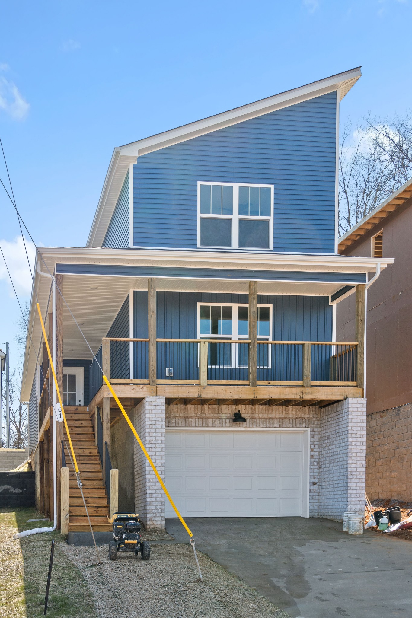 64 West High Street Clarksville, TN 37040 - Photo 2 of 22 a view of a house with wooden stairs