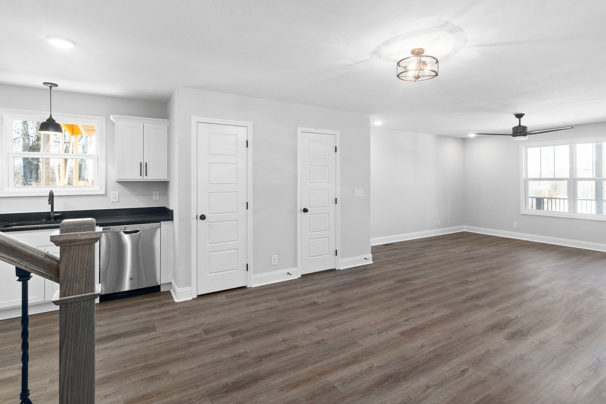 64 West High Street Clarksville, TN 37040 - Photo 3 of 22 a view of a kitchen with dishwasher and wooden floor