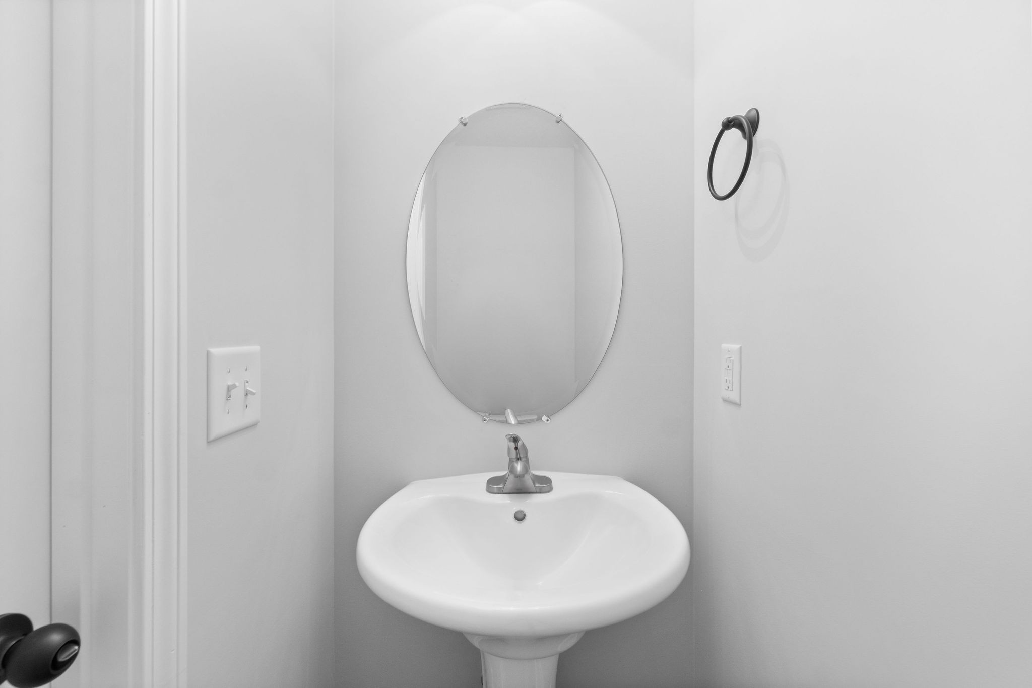 64 West High Street Clarksville, TN 37040 - Photo 8 of 22 a bathroom with a sink and mirror