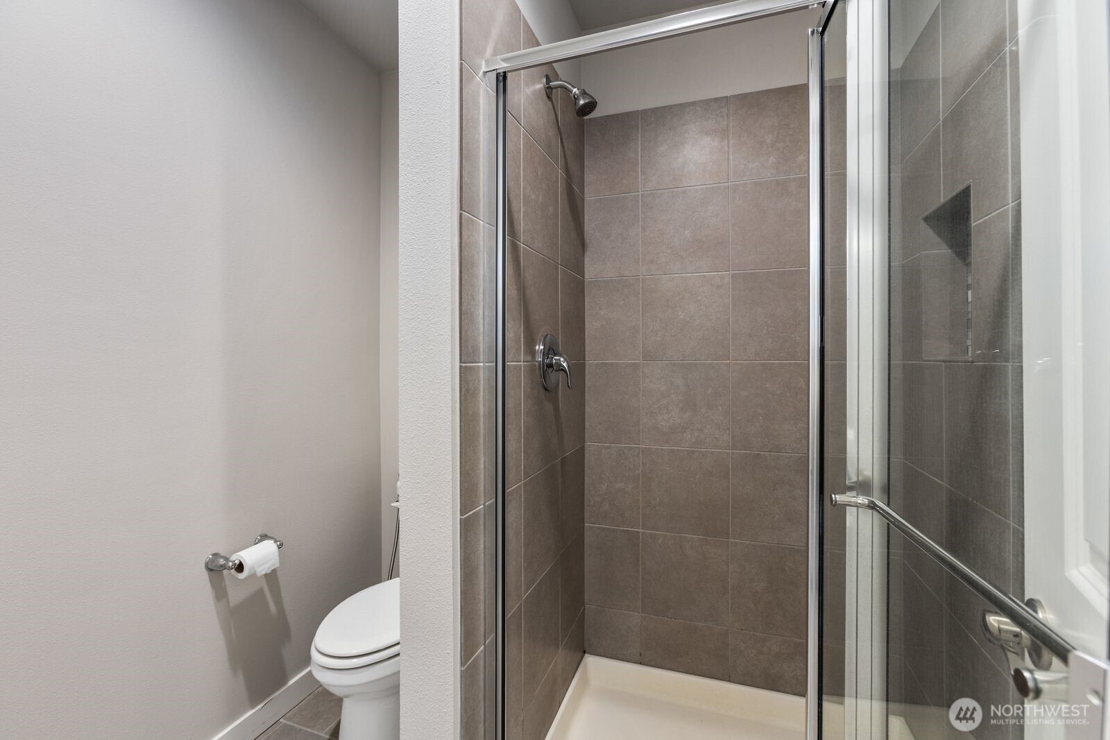 1621 Seattle Hill Road, Unit C4 Bothell, WA 98012 - Photo 21 of 35 a bathroom with a shower and a toilet
